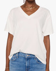 Boxy Supima cotton V-neck tee in blue by Mother, styled with jeans, hands in pockets, casual modern look.