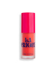 A small 10 mL bottle of Faire 03 Water Lip Balm Shade with a bright pink cap, orange liquid inside, and bold blue lettering on the front.