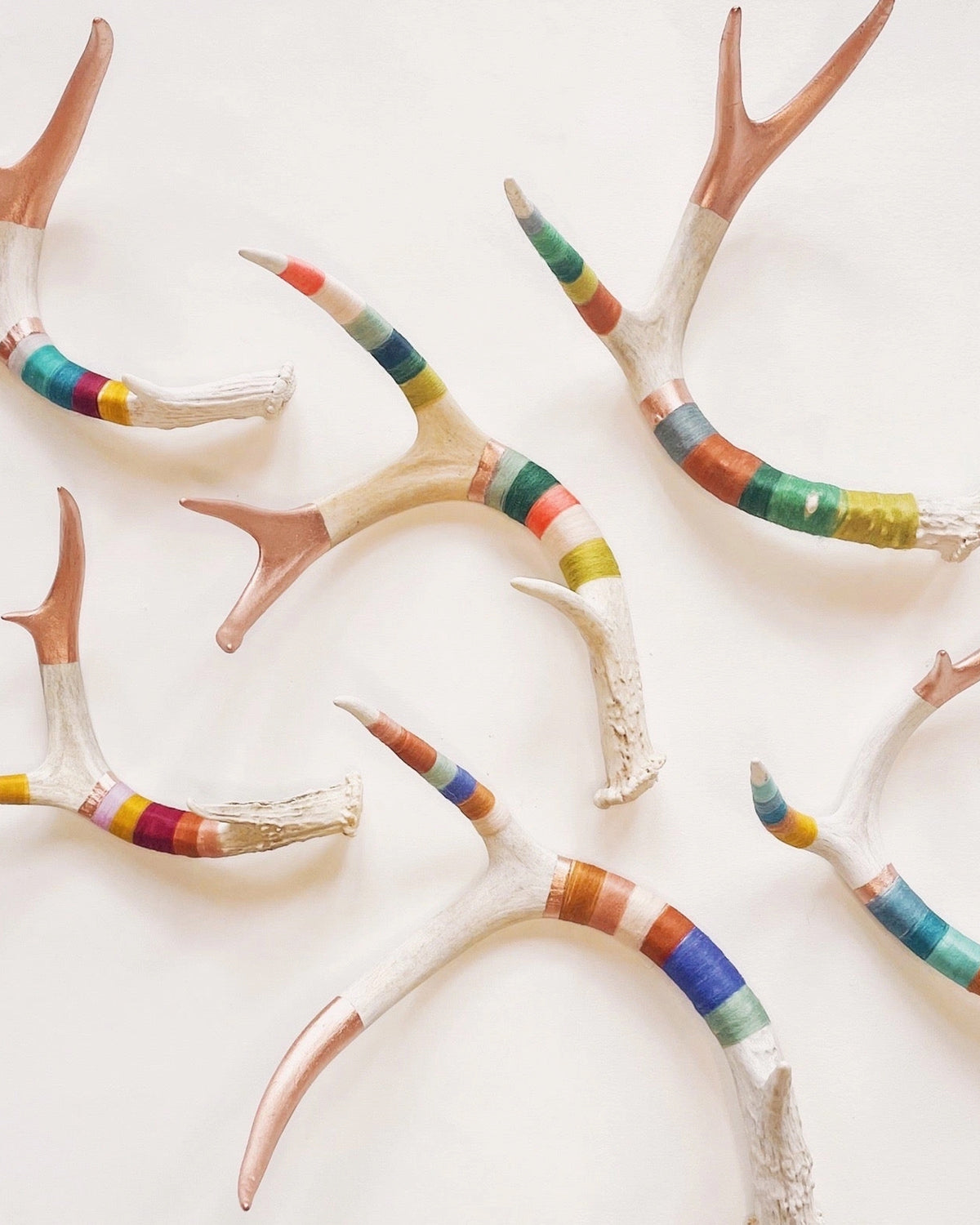 Whitetail deer antler wrapped in multicolored thread and copper wire, Bungalow Furniture &amp; Accessories.