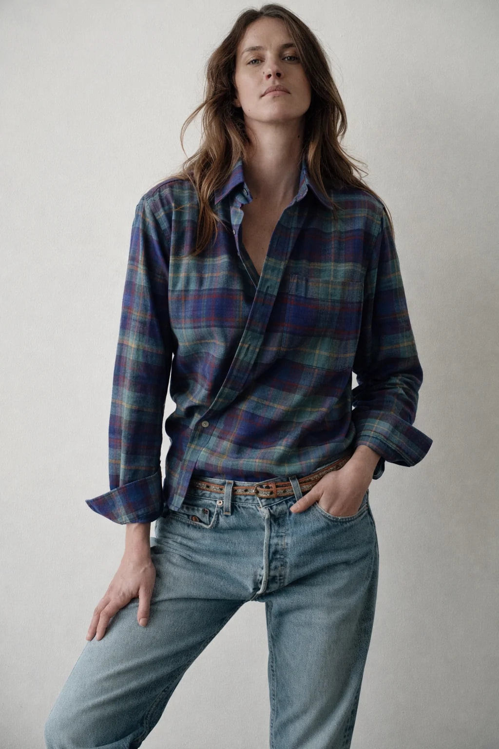 Blue plaid The Daily Shirt by Cissa, styled with light jeans on a minimal backdrop for Bungalow Furniture & Accessories.