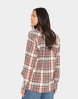 Xirena Beau Shirt in red, blue, and yellow plaid shown from the back on a model with long dark hair.