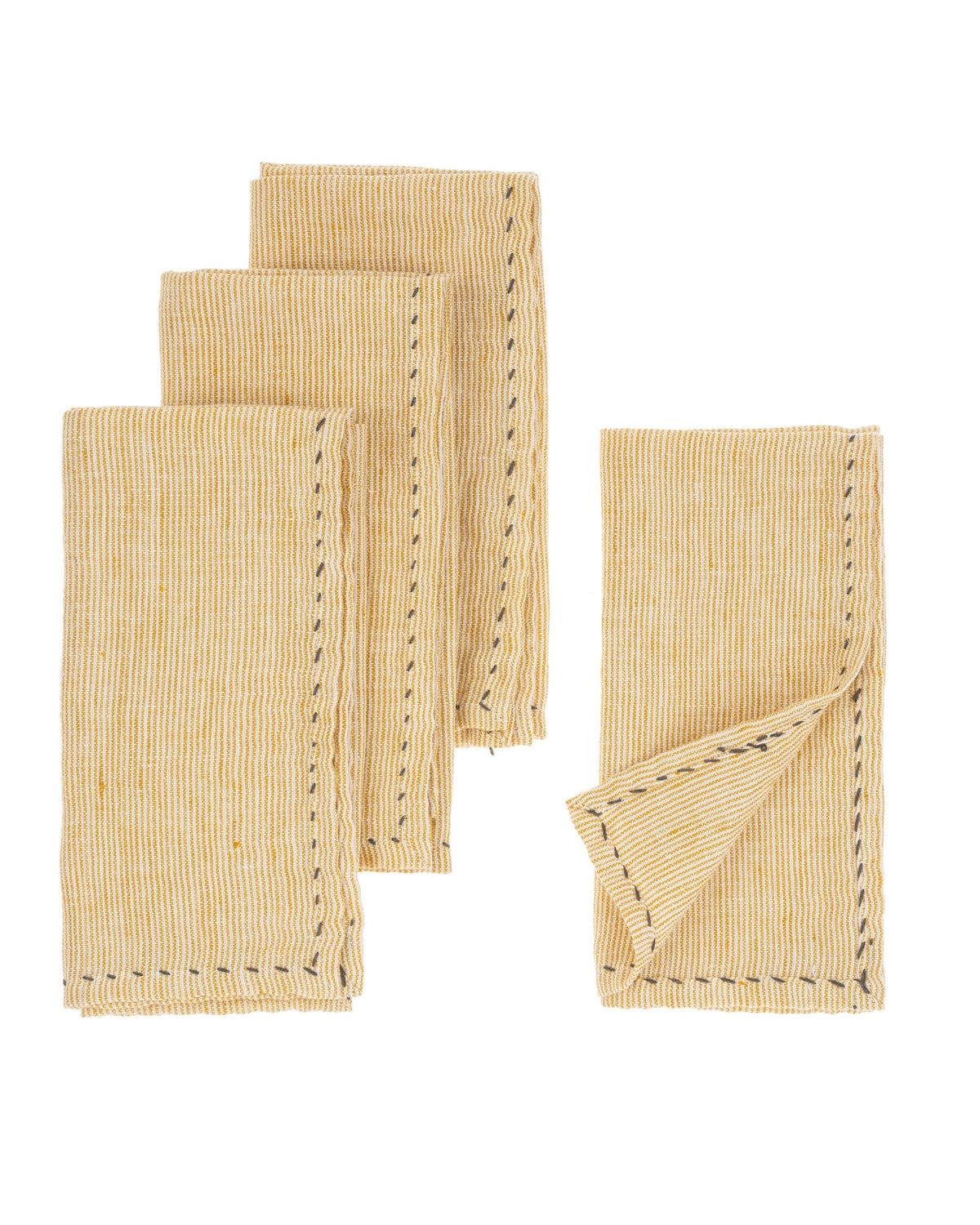 Yellow linen napkin with thin pinstripes and stitched edges, Indaba Pinstripe set at Bungalow Furniture & Accessories.