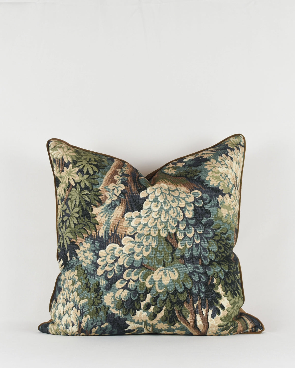 Velvet pillow with green, blue, and beige leafy forest pattern on white, Faire Yudi 22x22, Bungalow Furniture.